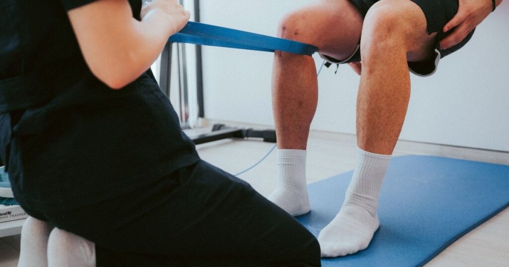 Male patient in a physical therapy session.